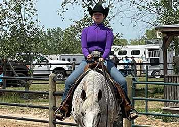 Dal Porto student Sophia with horse Maggie in April 2022